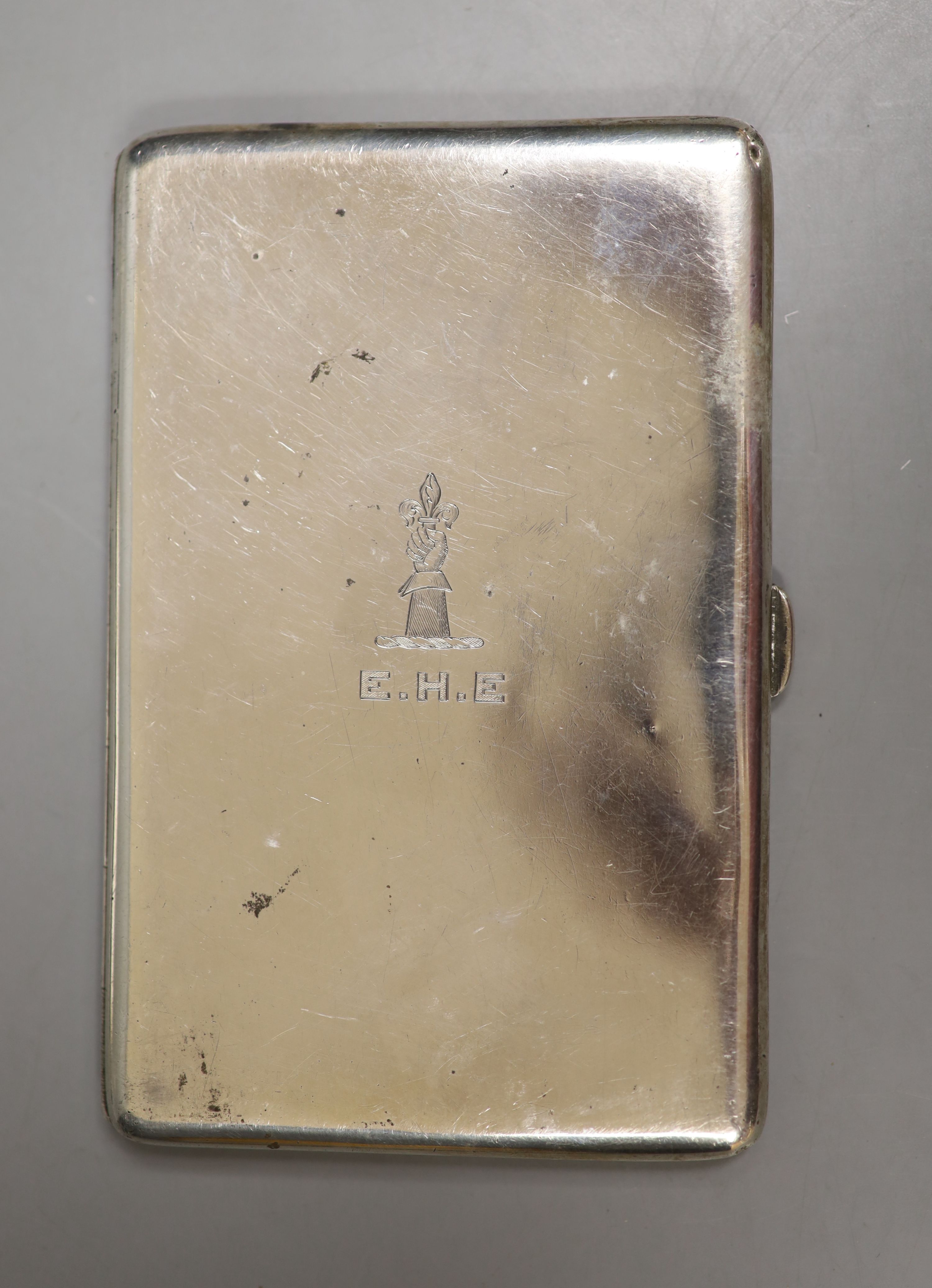 A George V silver cigarette case, 12.7 cm, a 900 standard white metal snuff box and five silver teaspoons..